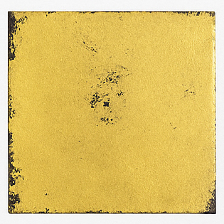 gold leaf with black clay bole